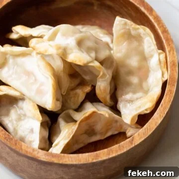Crispy Air Fryer Frozen Potstickers: Quick Cooking Guide 7 potstickers in a bowl