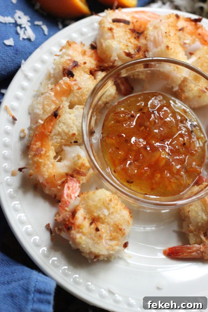 Crispy Air-Fried Coconut Shrimp Recipe with Tangy Dipping Sauce 6 Toasted coconut shrimp served with an orange marmalade dipping sauce