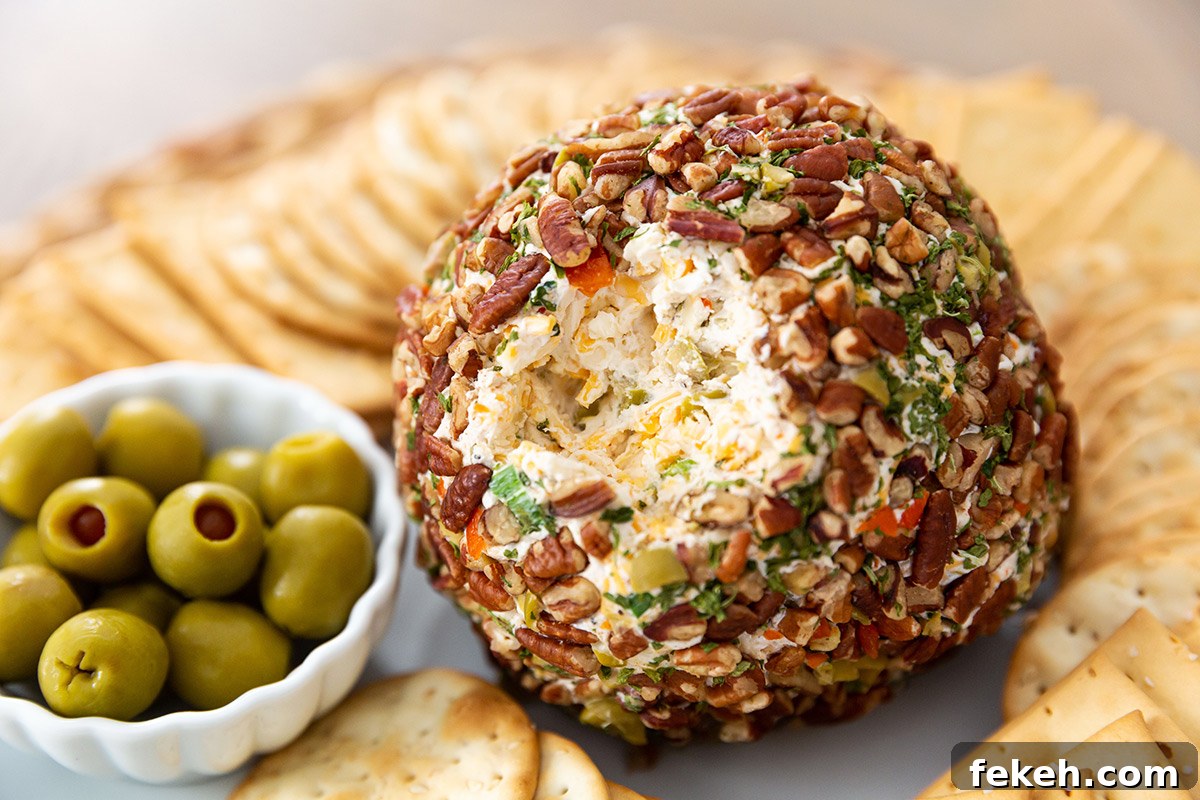 Savory Olive and Cheese Ball Recipe for Entertaining 3 Olive Cheeseball with Pecans