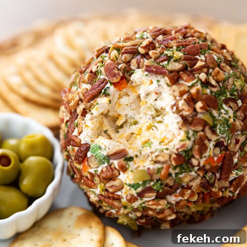 Savory Olive and Cheese Ball Recipe for Entertaining 7 Olive Cheeseball with Pecans