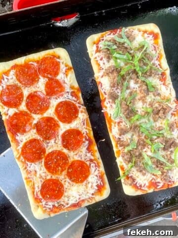 Flatbread pizzas on the Blackstone griddle.