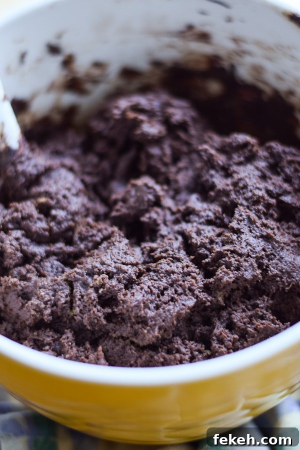 Decadent Chocolate Mint Cookie Recipes for Mint Lovers 7 Chocolate cookie dough in a yellow bowl