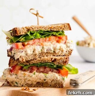 greek yogurt tuna salad sandwich on wooden board