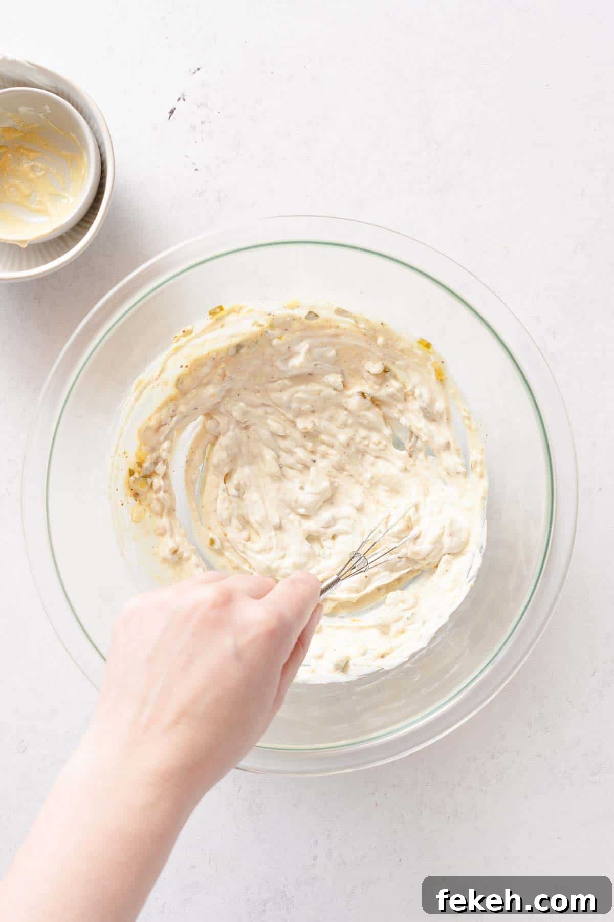 Greek Yogurt Tuna Salad Recipe Without Mayo — High-Protein Lunch 7 Greek dressing for tuna salad being whisked together in bowl