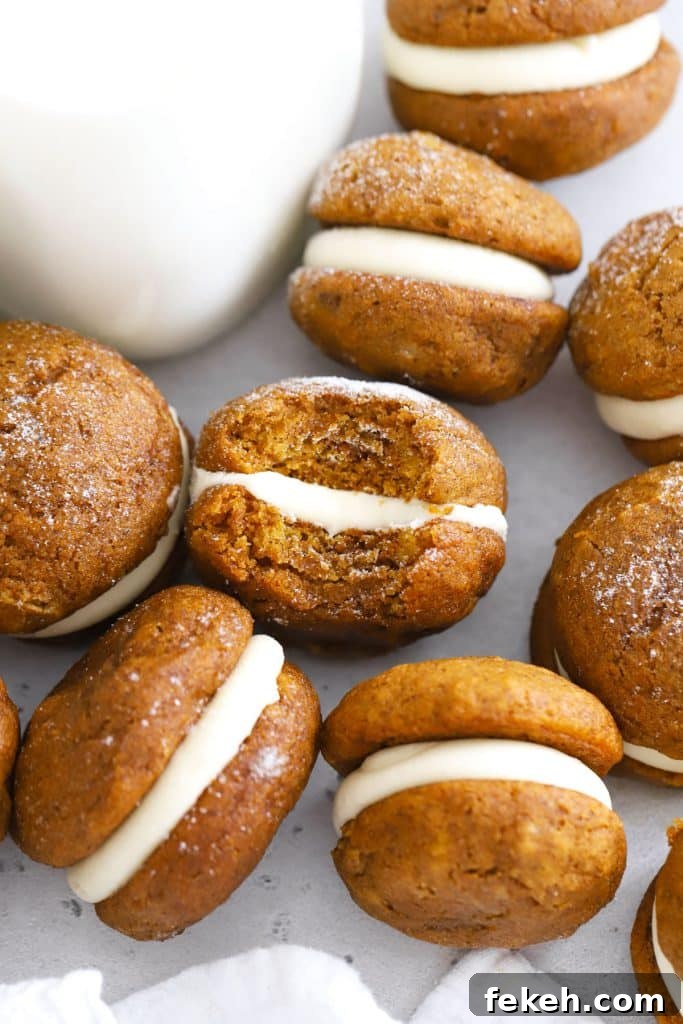 Gluten-Free Pumpkin Snickerdoodle Cookies for Fall Baking 12 Gluten-Free Pumpkin Whoopie Pies with Cream Cheese Filling on a white background