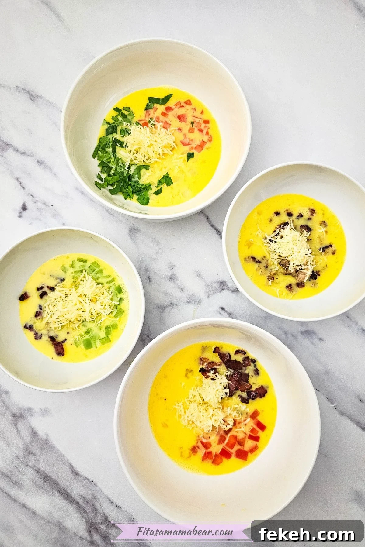 Dairy-Free Gluten-Free Egg Bites Recipe for Meal Prep 6 Four bowls of uncooked omelets.
