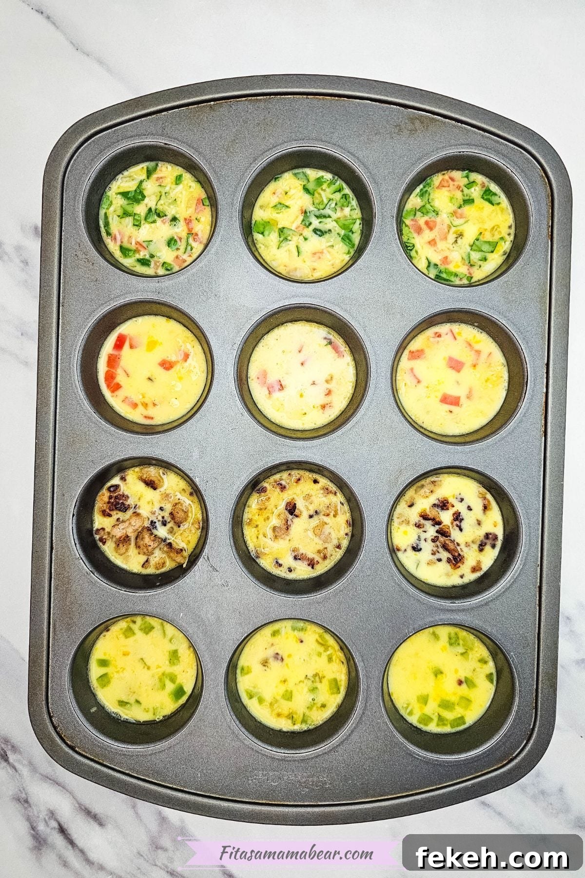 Dairy-Free Gluten-Free Egg Bites Recipe for Meal Prep 7 Uncooked mini omelets in a muffin tin.