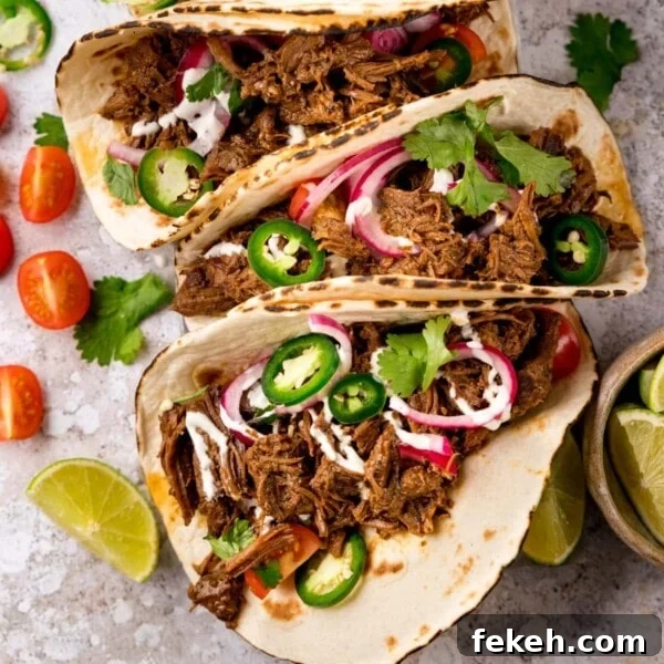 Grilled Chicken Souvlaki Recipe: Tender Mediterranean Skewers 8 Square image of beef barbacoa on soft tacos topped with red onion and jalapeno slices