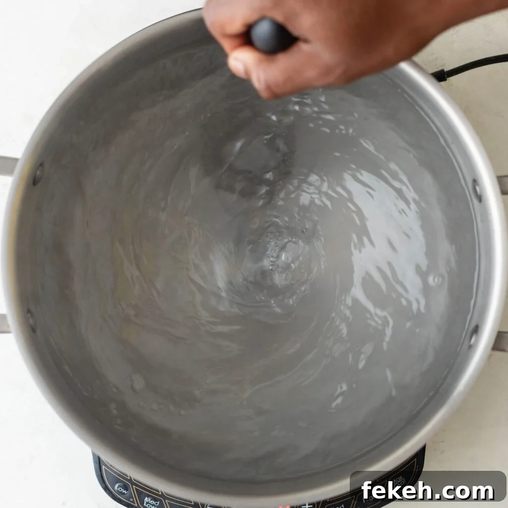 Crispy Southern Fried Chicken Wings Recipe for Perfect Crunch 11 whisking salt and sugar to dissolve in boiling water