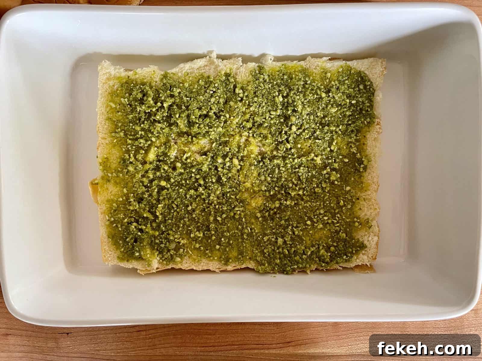 Antipasto Sliders on King's Hawaiian Rolls: Italian Sandwich Recipe 5 Pesto spread over the bottom half of the King's Hawaiian Rolls.