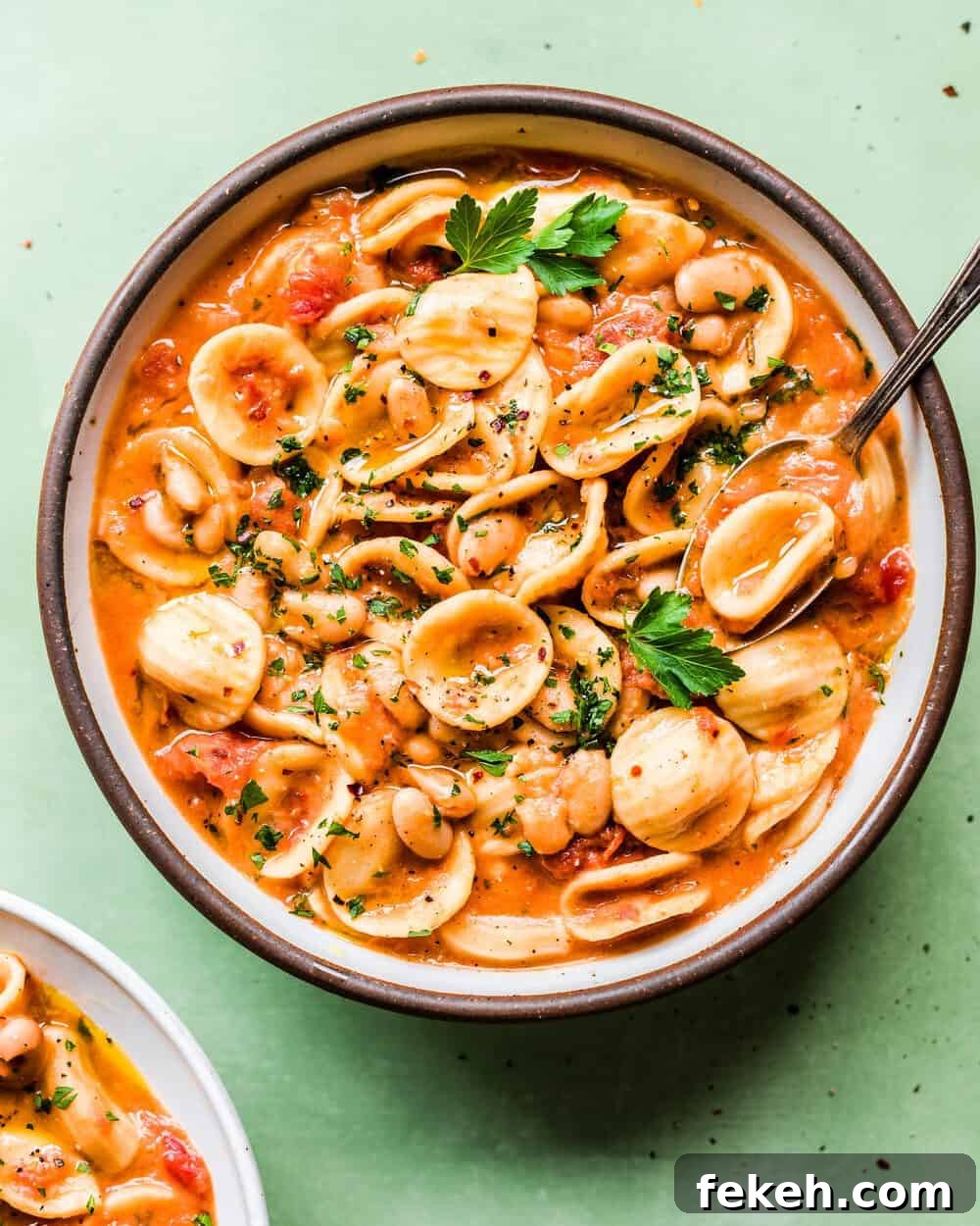 Italian White Bean and Pasta Stew with Garlic & Herbs (Vegan) 5 bowl of stew on a table.