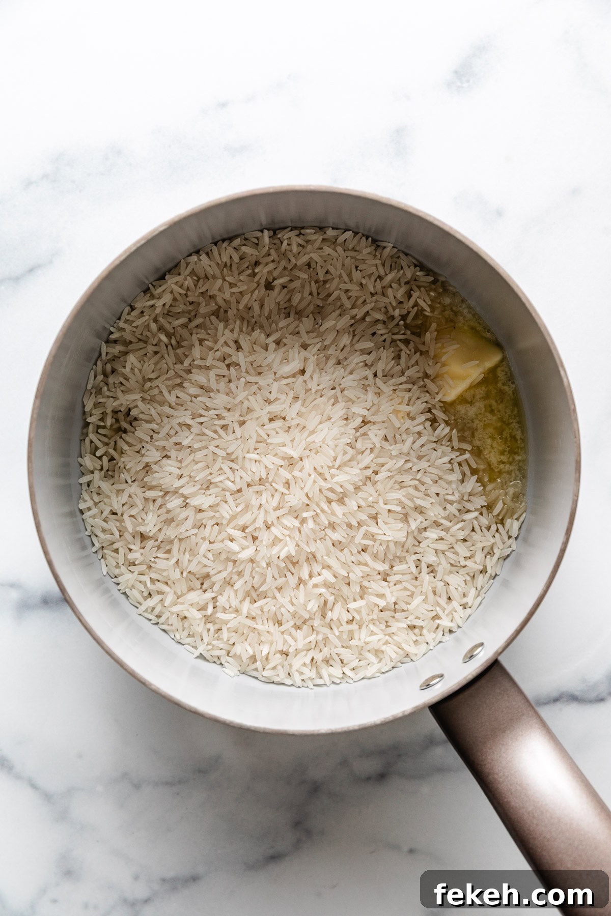 Rice and butter in a pan,