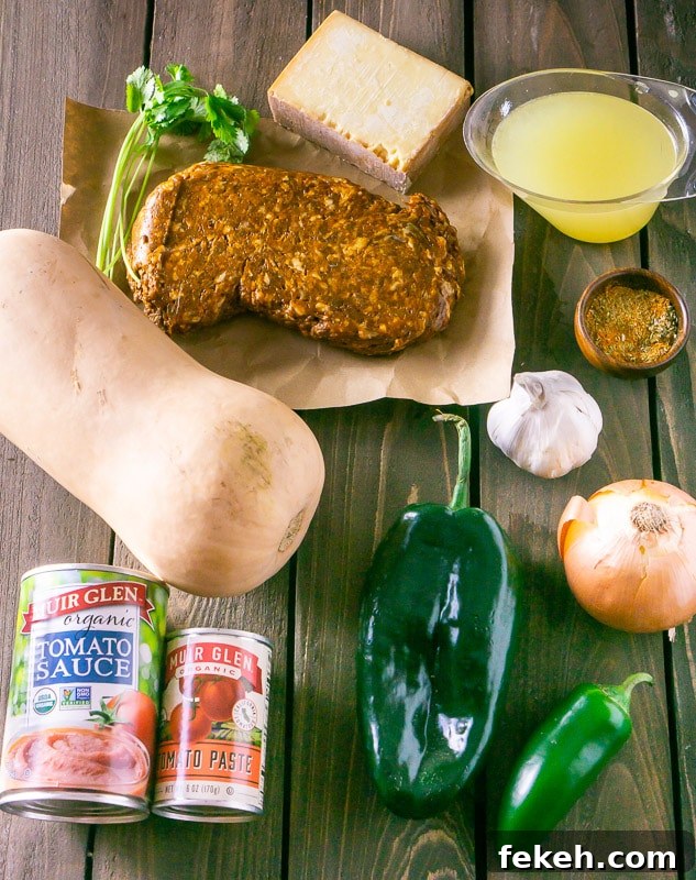 Baked Chorizo and Butternut Squash Chile Rellenos Recipe 3 The ingredients for chorizo-butternut squash chile rellenos: butternut squash, chorizo, cilantro, cheese, chicken stock, spices, garlic, onion, jalapeno, pasilla pepper, tomato sauce and tomato paste.