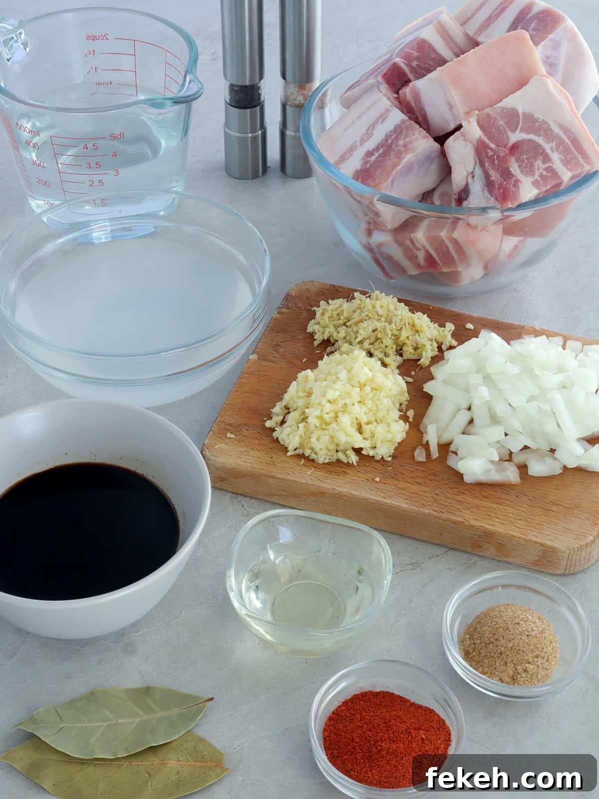 Pork Ribs Adobo with Atsuete Oil Infusion 3 pork ribs, garlic, onions, atsuete, soy sauce, vinegar, water, salt, pepper, ginger, brown sugar