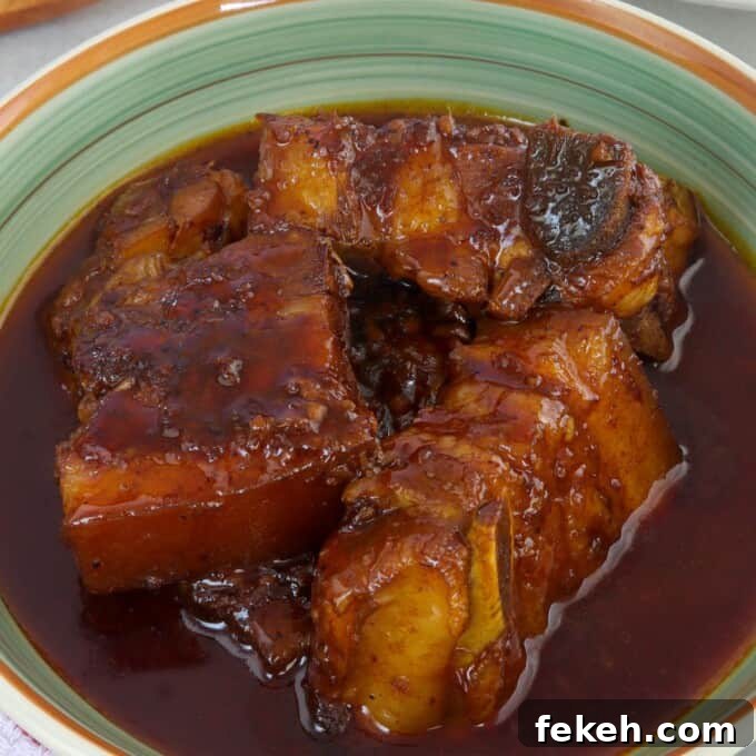 Pork Ribs Adobo with Atsuete Oil Infusion 6 adobong pula in a serving bowl