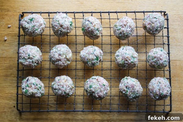 meatballs on a wire rack on a table