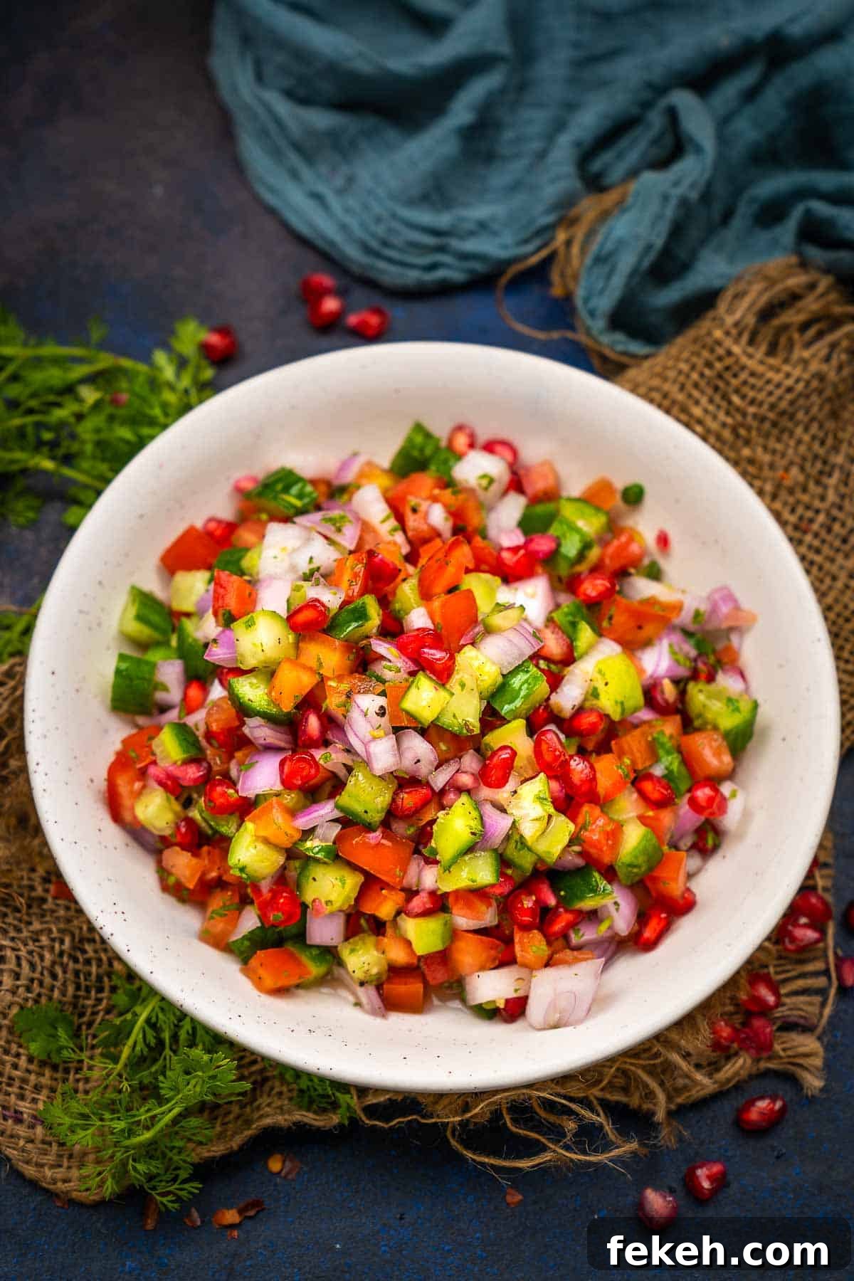 Fresh Kachumber Salad Recipe: Indian Cucumber Tomato Salad Guide 2 Kachumber salad served in a bowl.