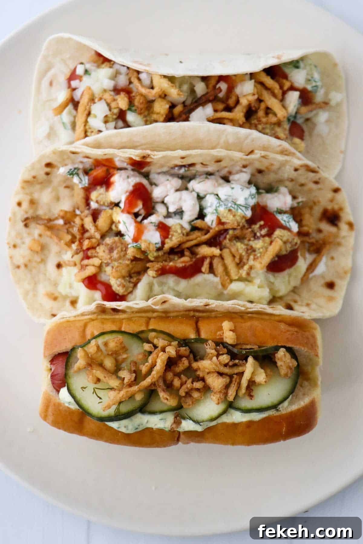 Danish, Norwegian and Swedish Hot Dogs together on a white plate.
