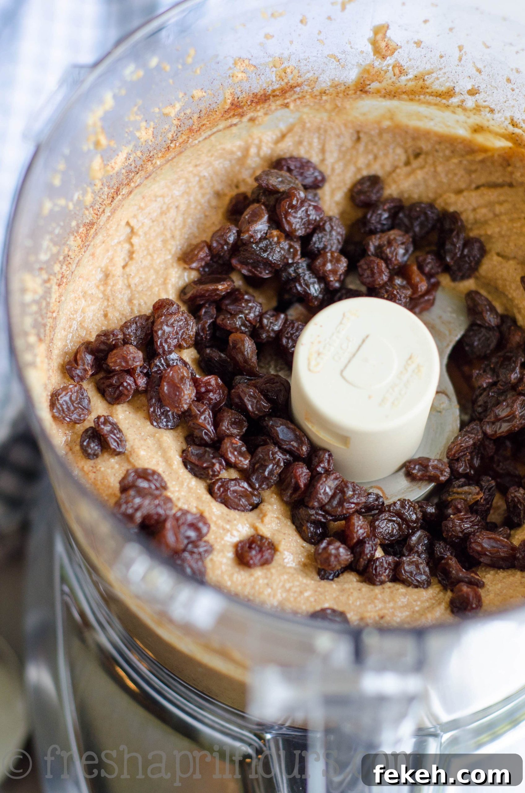 cinnamon raisin peanut butter in a food processor