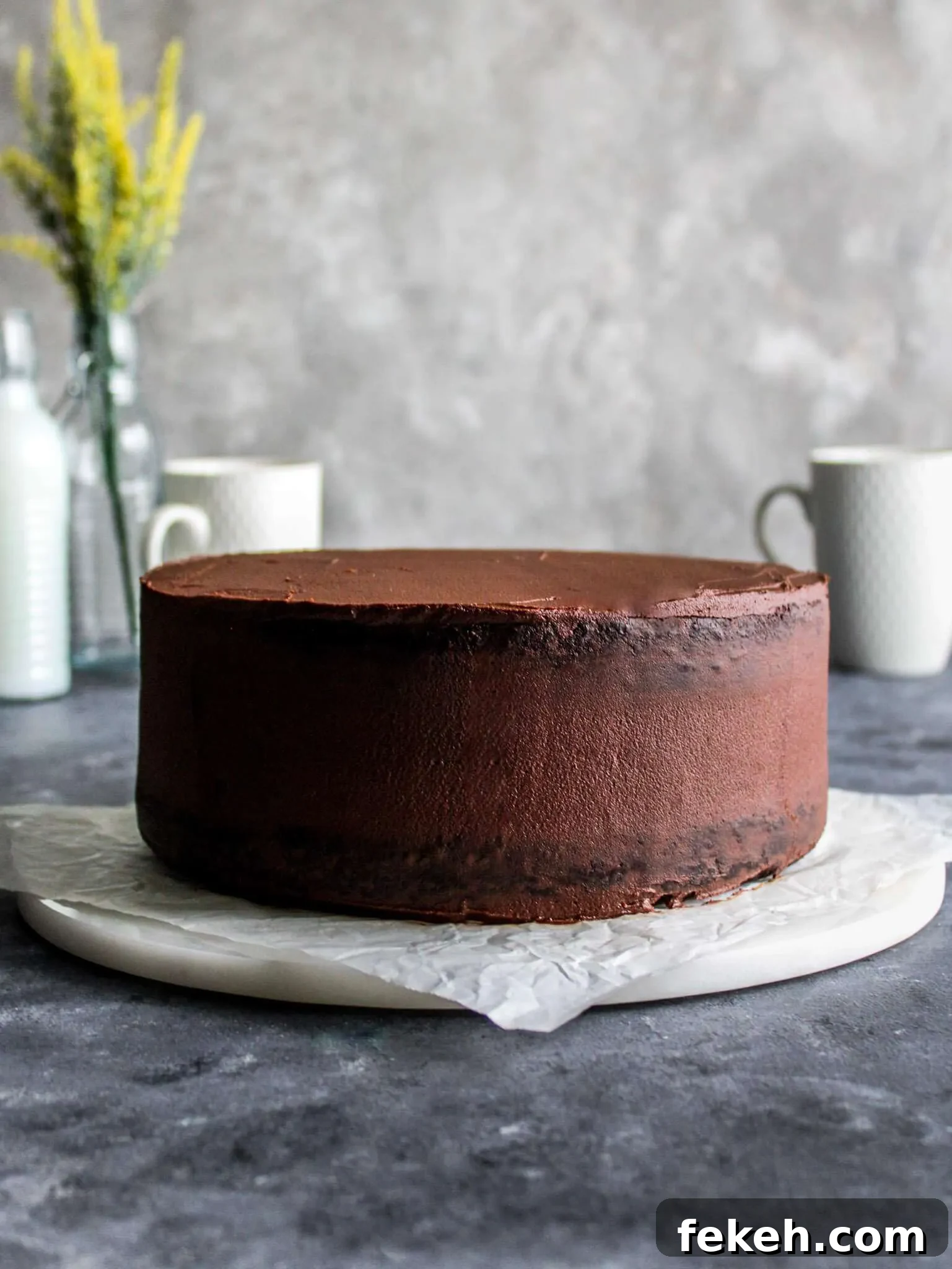layered cake with ganache frosting