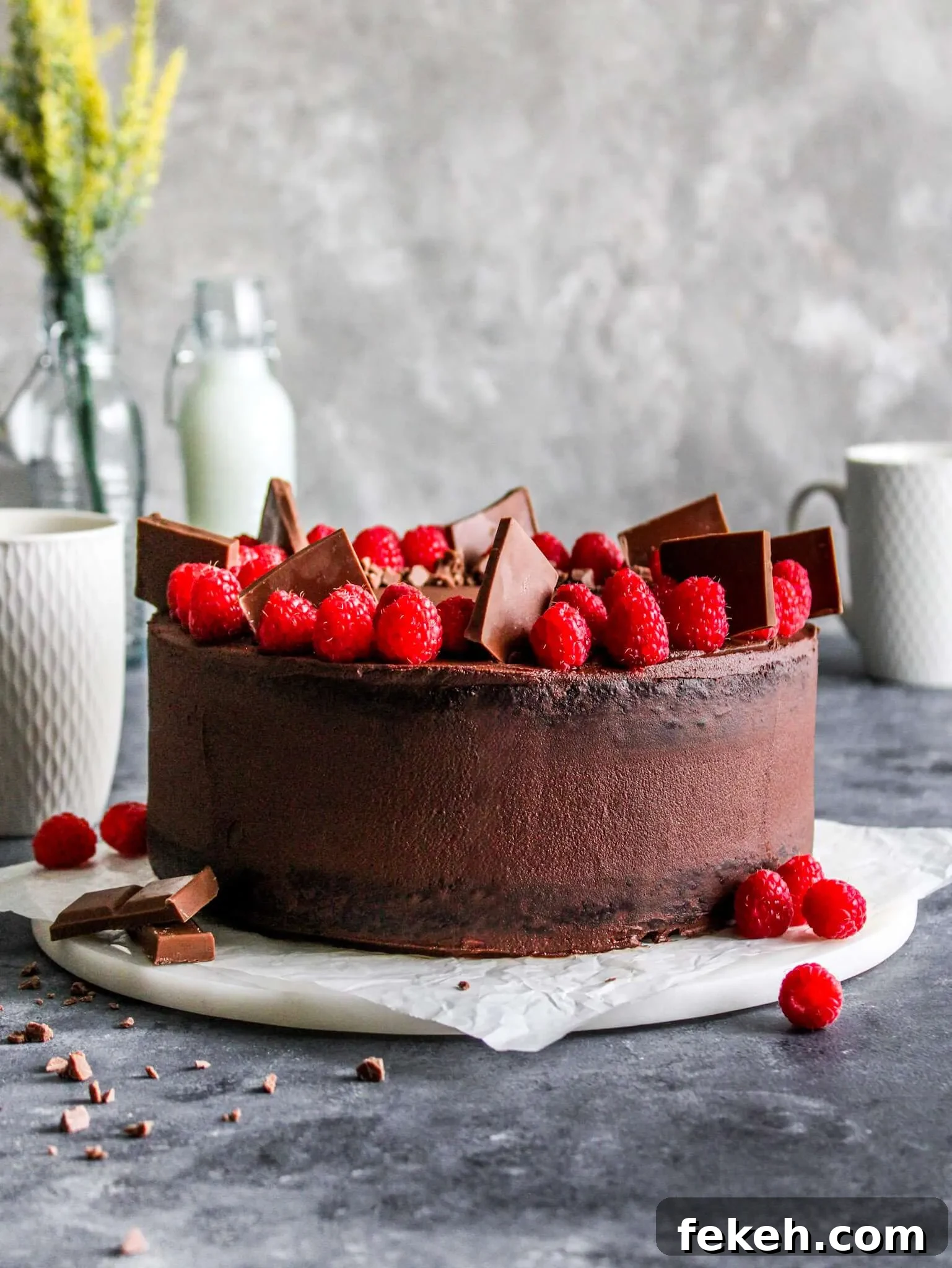 decorated raspberry chocolate cake on serving plate (1)