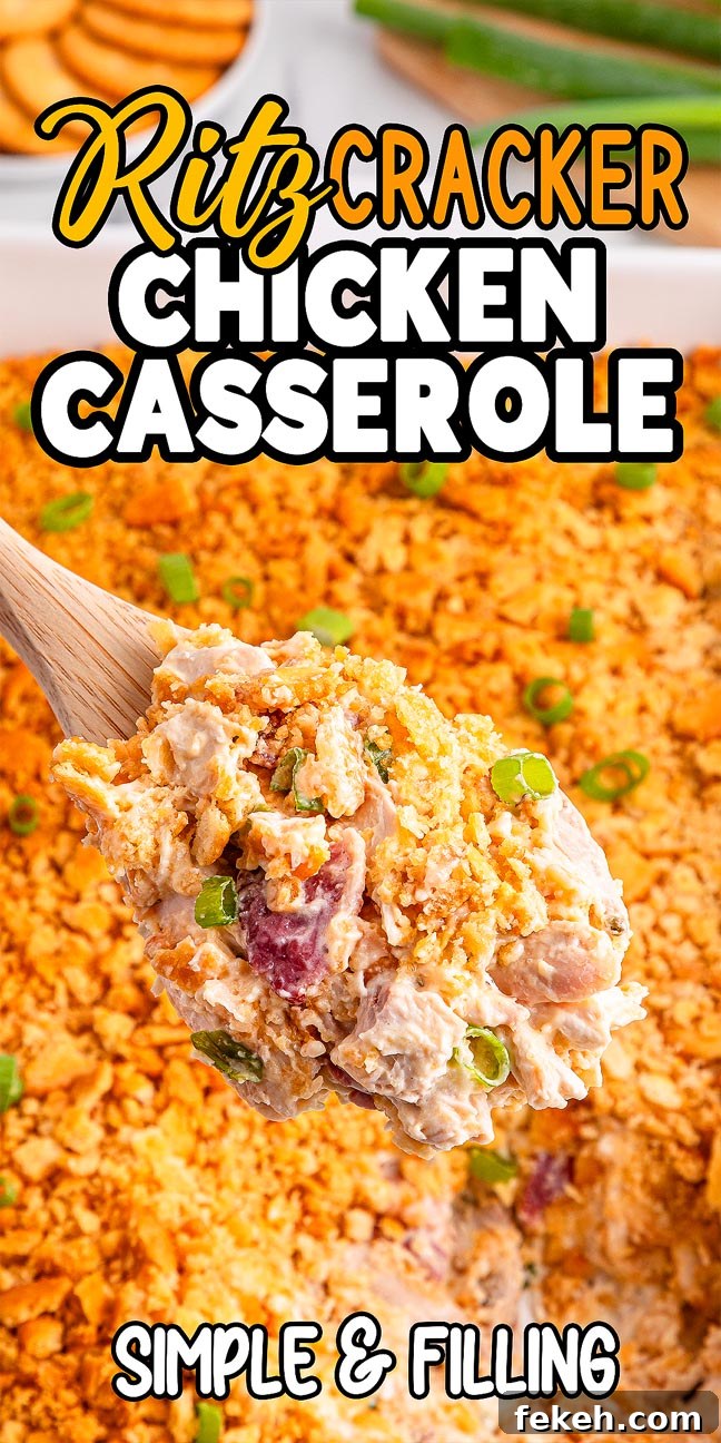 A wooden spoon scoops creamy Ritz Cracker Chicken Casserole, topped with crushed crackers and green onions.