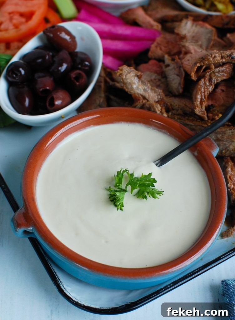 Tahini Sauce in teal dish