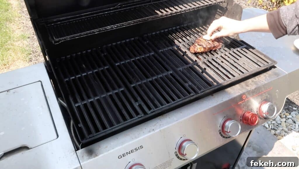 Adding pat of butter to steak