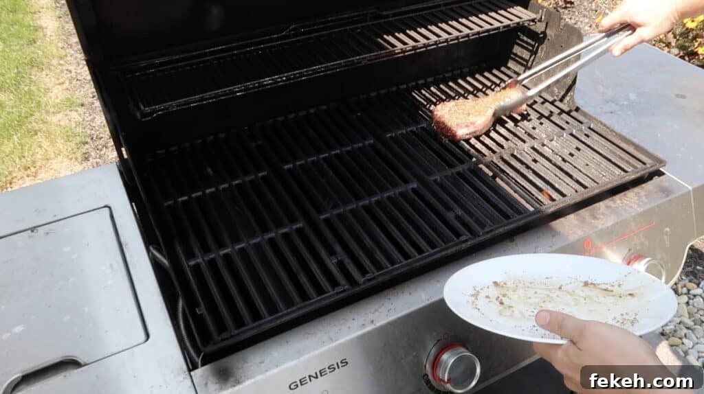 Placing steak on grill