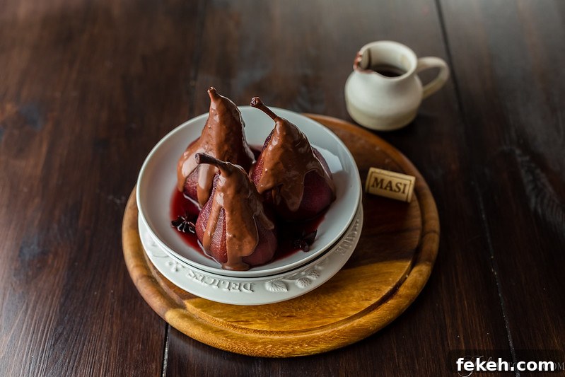 Red wine poached pears with chocolate sauce